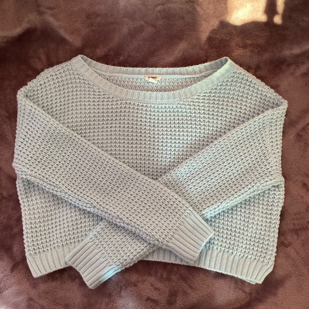 light blue sweater